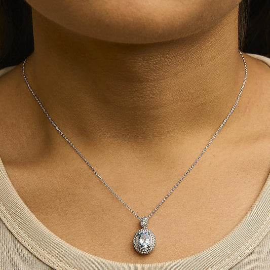 Sterling Silver Oval Blue Topaz and Diamond Accent with Beaded Halo Pendant Necklace - 18" Inches